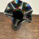 Vintage iridescent glass vase with ribbed design and ruffled neck, H 21 cm.