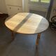Table ovale en bois bords rabattables