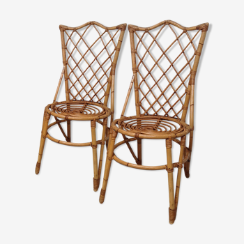 Pair of rattan chairs by Louis Sognot