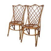 Pair of rattan chairs by Louis Sognot