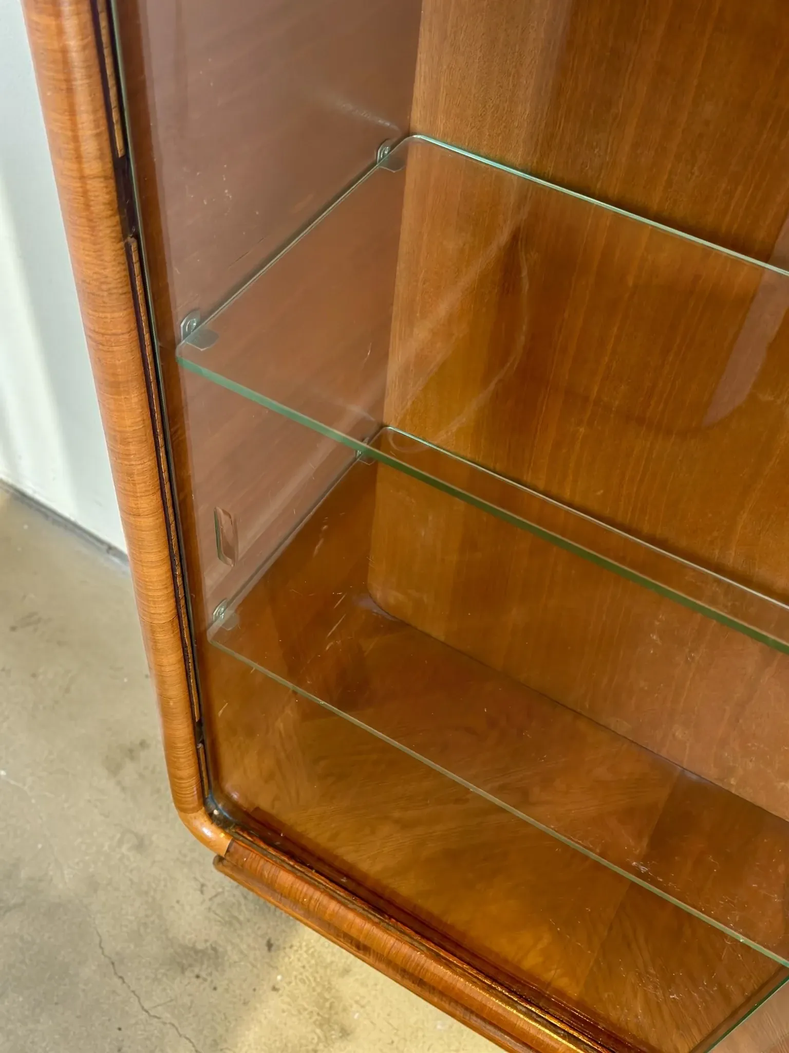 Vintage Art Deco display cabinet in mahogany with a black marble top.