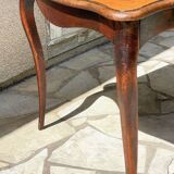 Solid wood table with curved legs