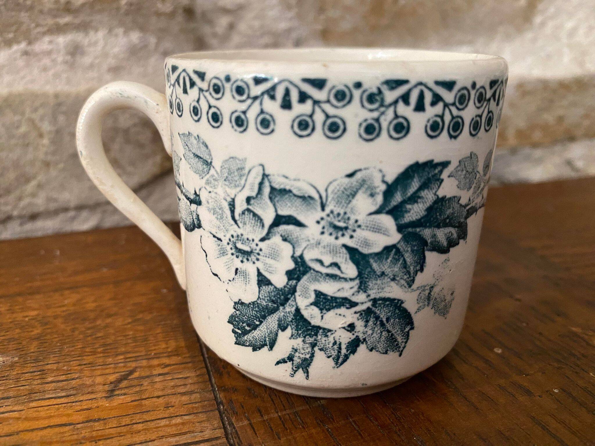 Cup and saucer old Iron earth stamped H.B.C.M Guadeloupe decoration flowers blue-green