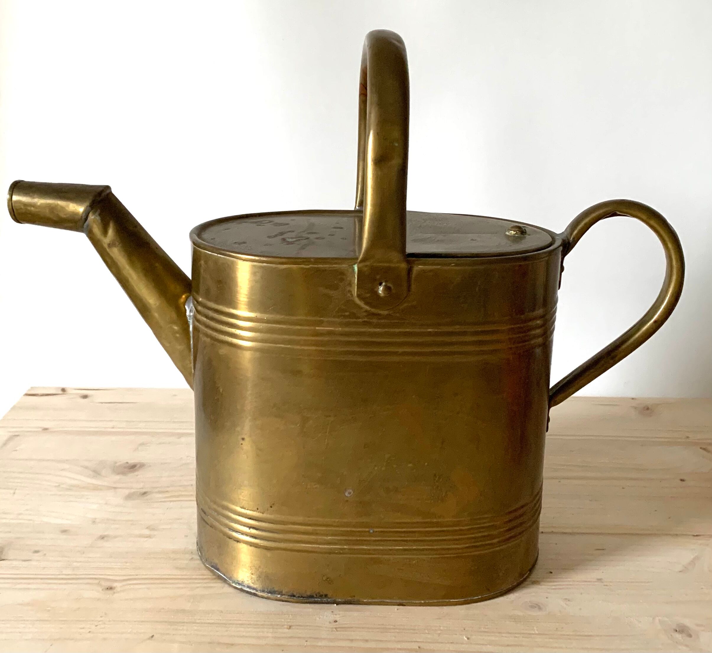 Brass watering can