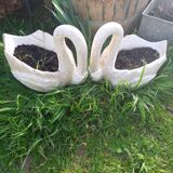 Swan-shaped garden vases in reconstituted stone