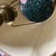 Turned wooden lamp, tartan lampshade.