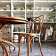 Thonet table no. 3 and 4 bent beech chairs with caning, circa 1890.