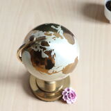 Globe Planet brass cigarette dispenser