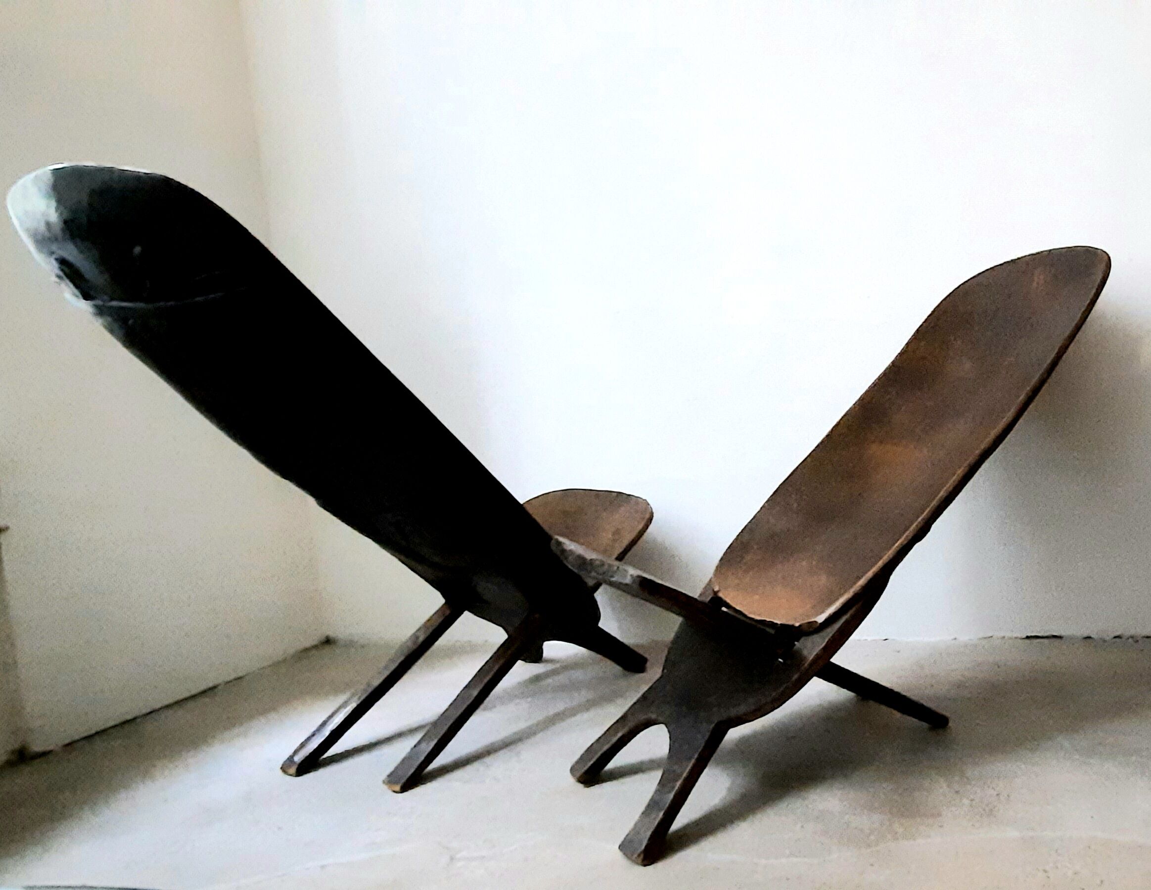 Pair of vintage raw wood African armchairs