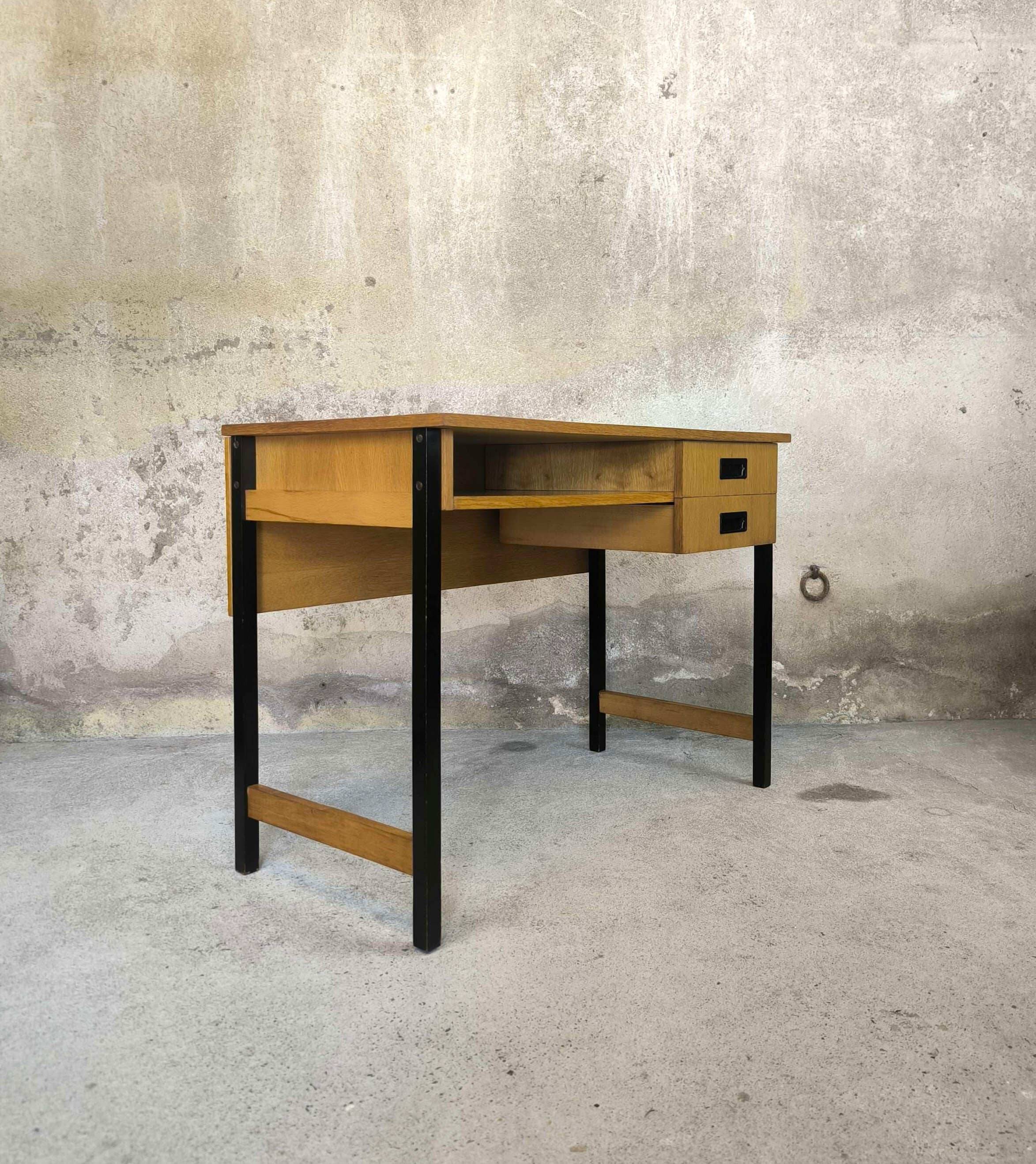 Vintage desk in modernist style made of wood.