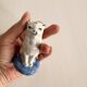 Small ancient glazed ceramic cat from the 19th century.