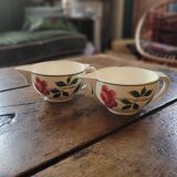 Pair of hand-painted floral-decorated jugs