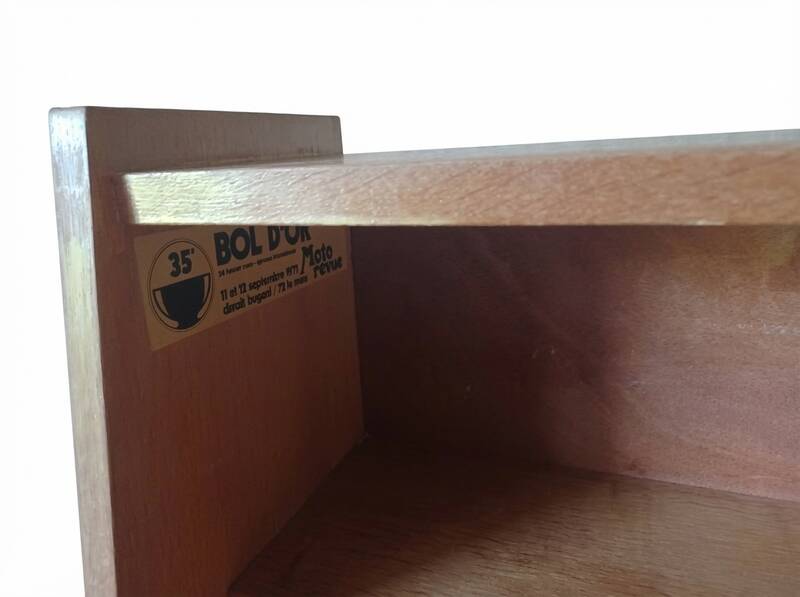 Vintage 1960s secretary desk with an angled design, light wood, and tapered legs.