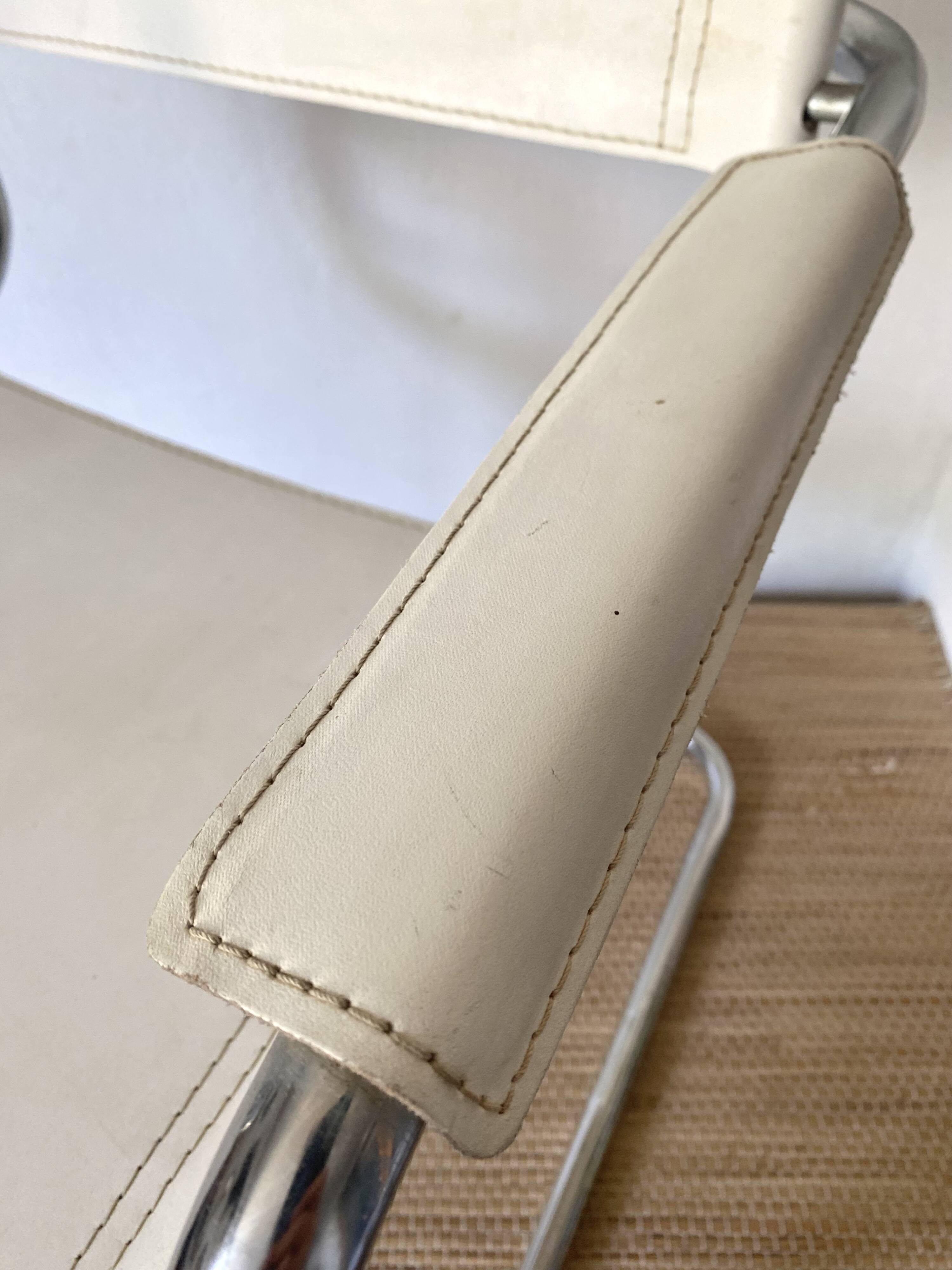 Matteo Grassi style faux leather and chrome armchair