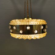 Ceiling-hanging lamp in glass with prisms and metal details