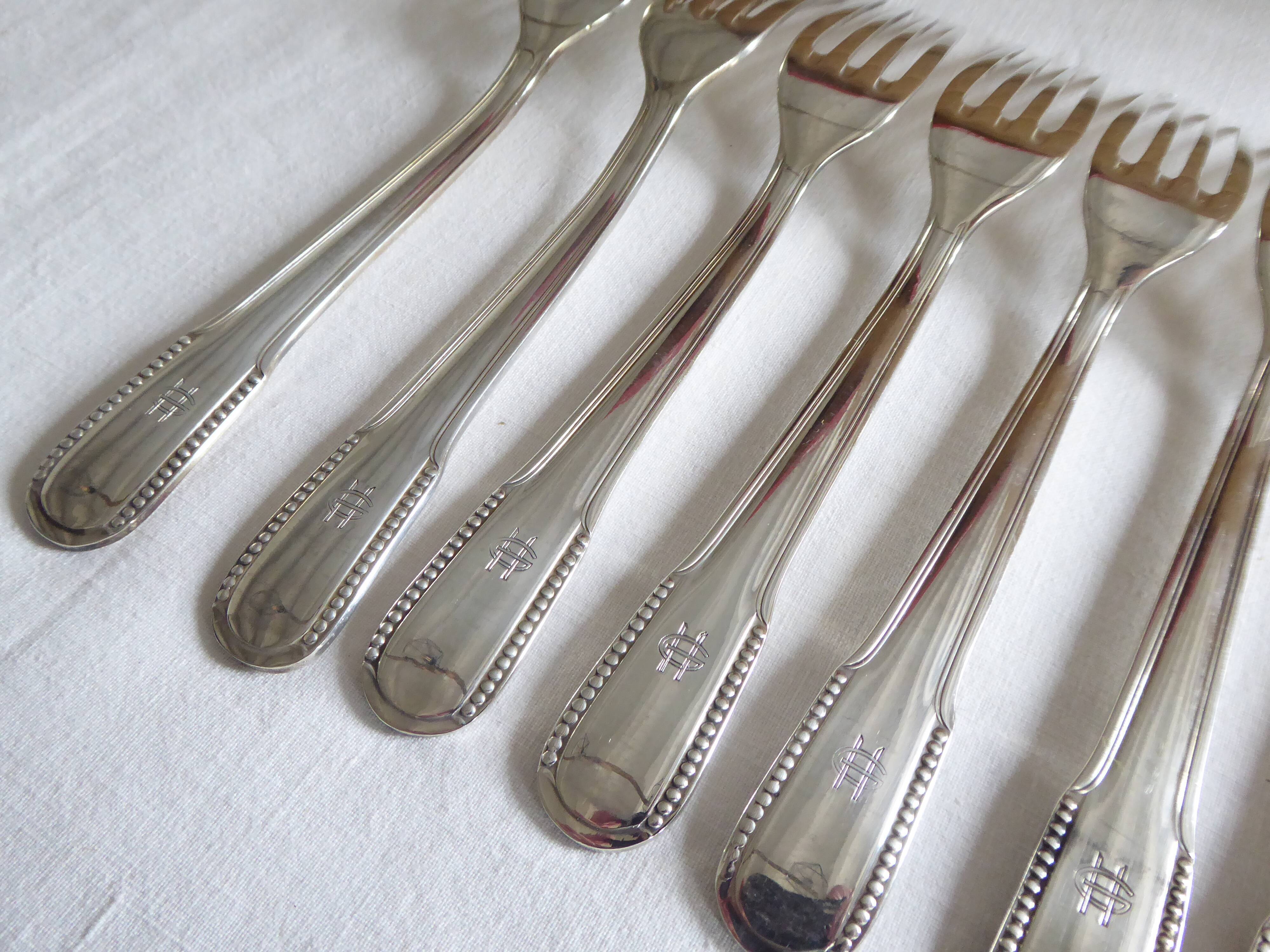 12 dessert forks, silver metal