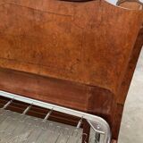 Brown lacquered wooden double bed frame in Mid-Century style from the 1940s.