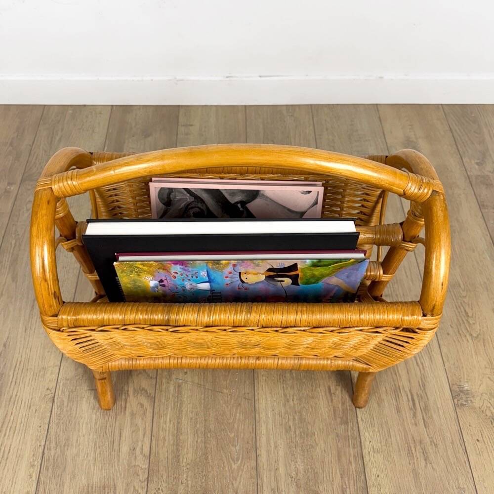 Vintage caramel-colored bamboo and rattan magazine rack