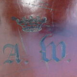 Old monogrammed leather travel suitcase and barony crown