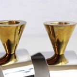 Pair of chromed metal and brass candlesticks