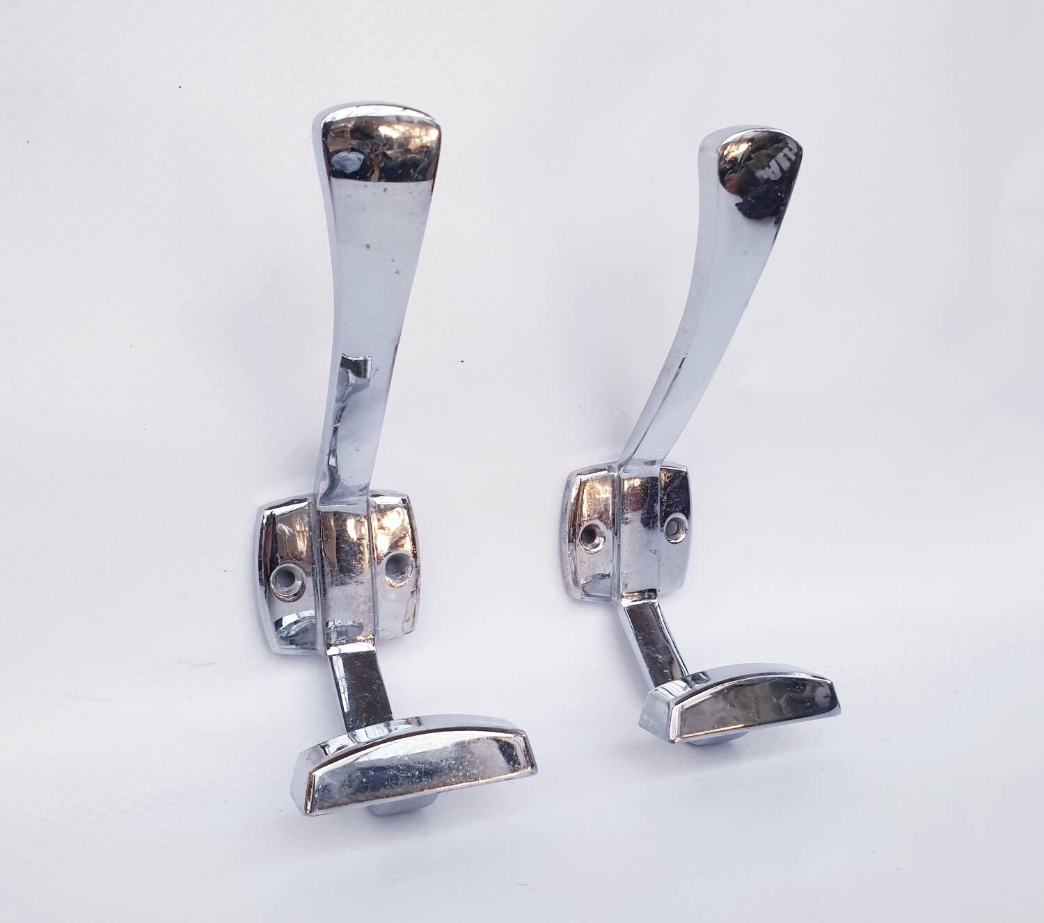Pair of vintage chrome metal wall hooks