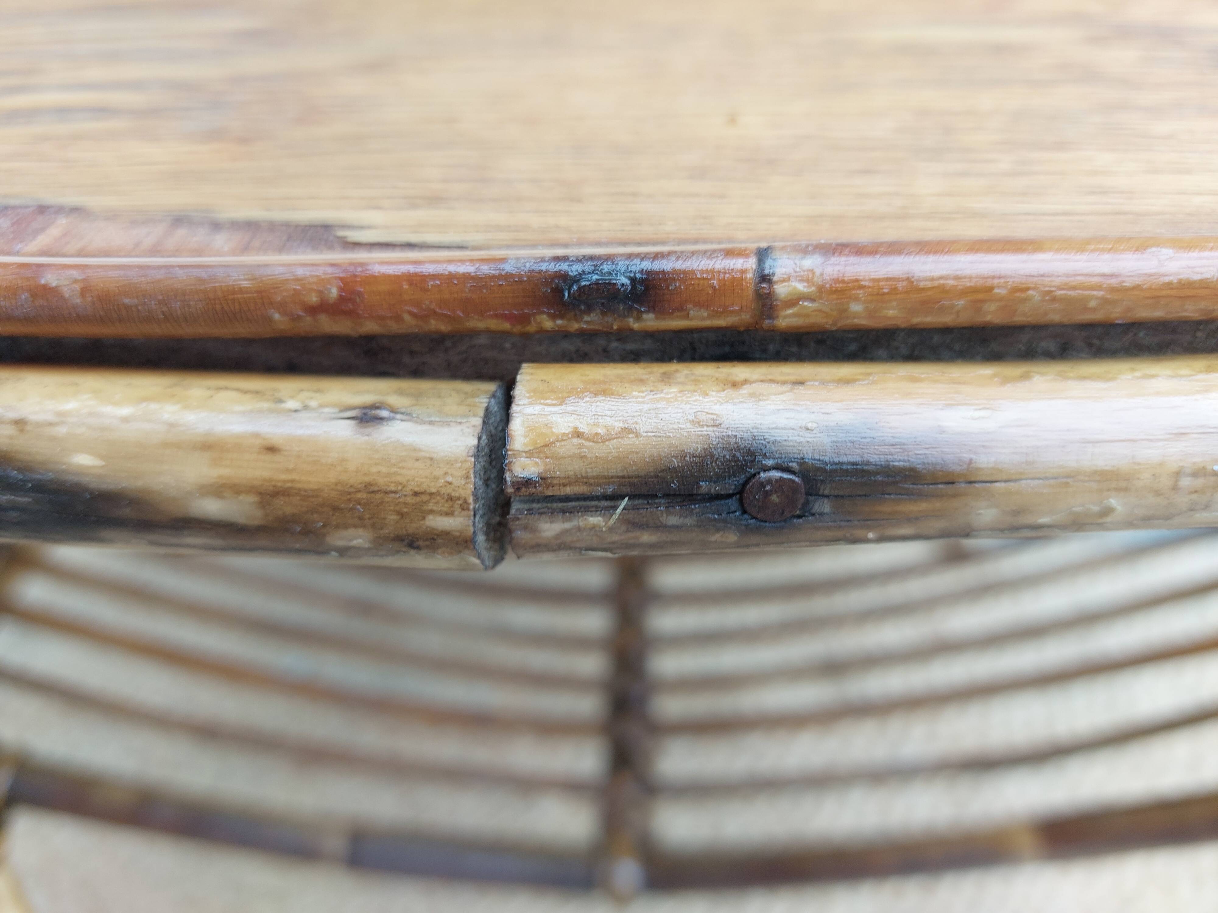 4 armchairs and a coffee table made of rattan and bamboo wood, vintage.