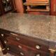 Commodity with mahogany detached columns and Empire gilded bronze ornaments