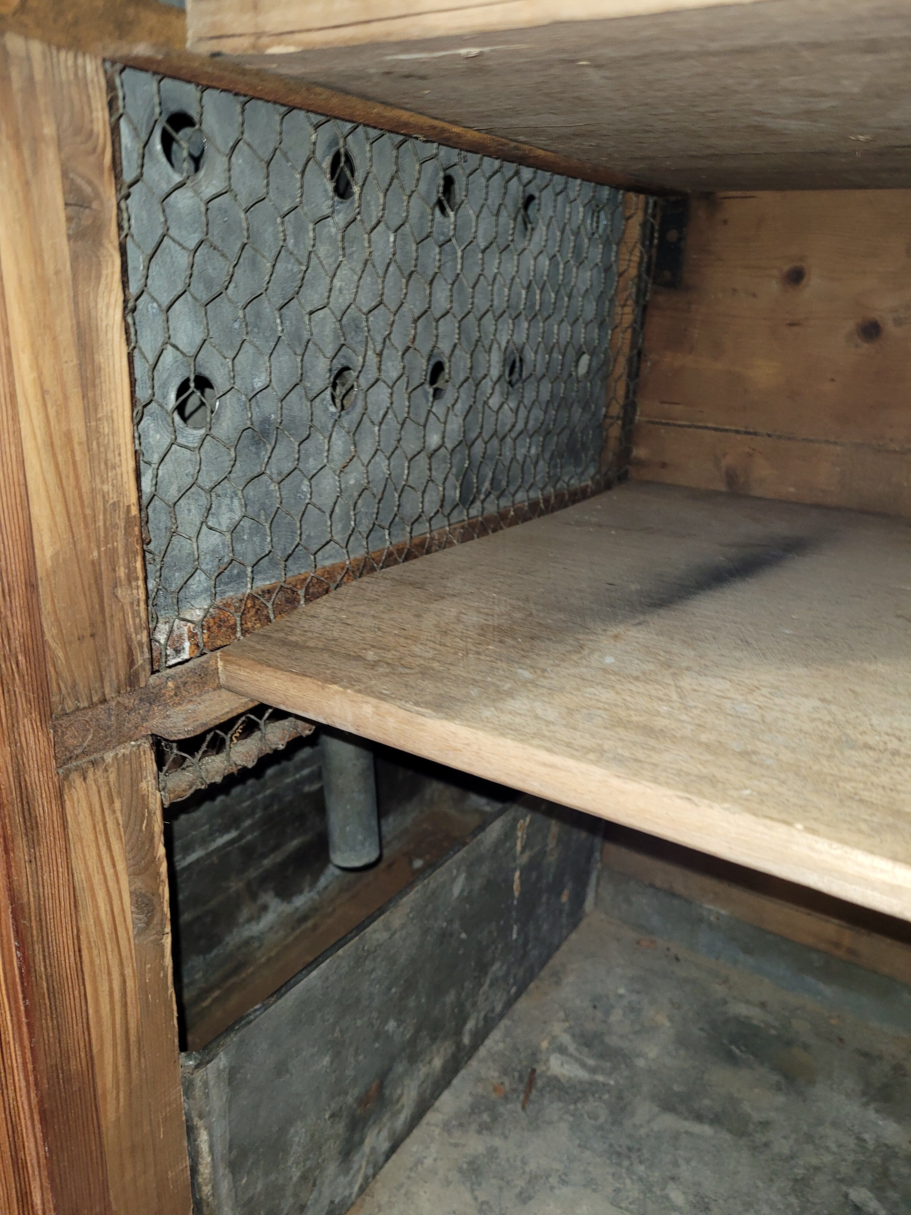 Antique cooler with a door