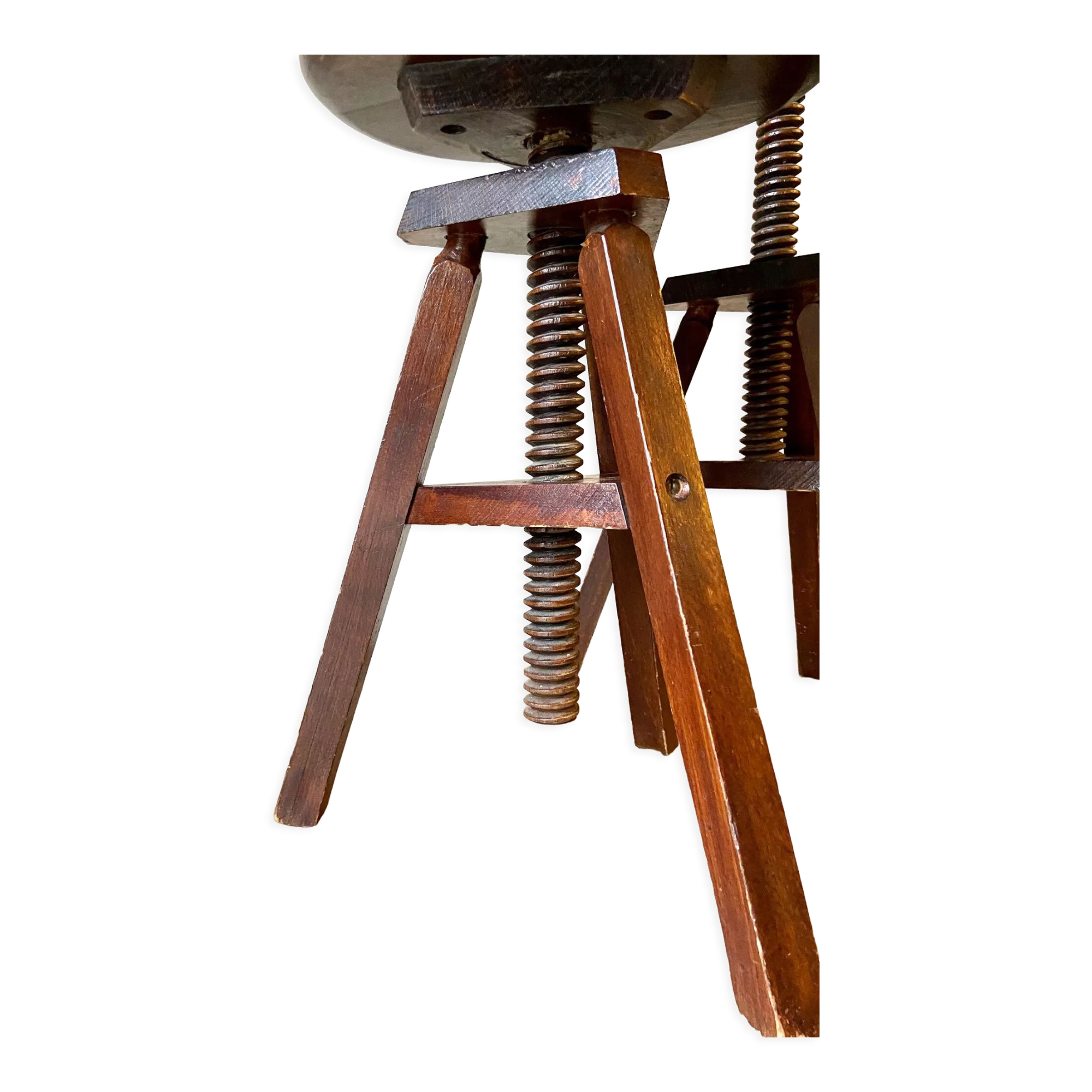 2 tripod stools with dark wood screws