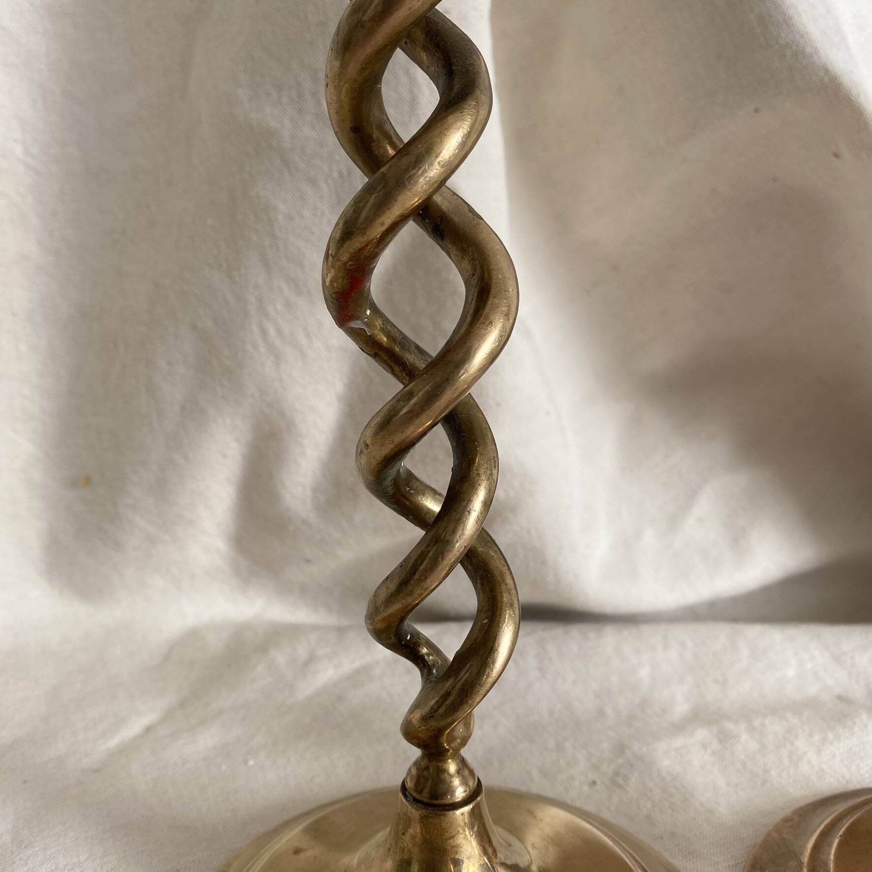 Pair of twisted brass candlesticks