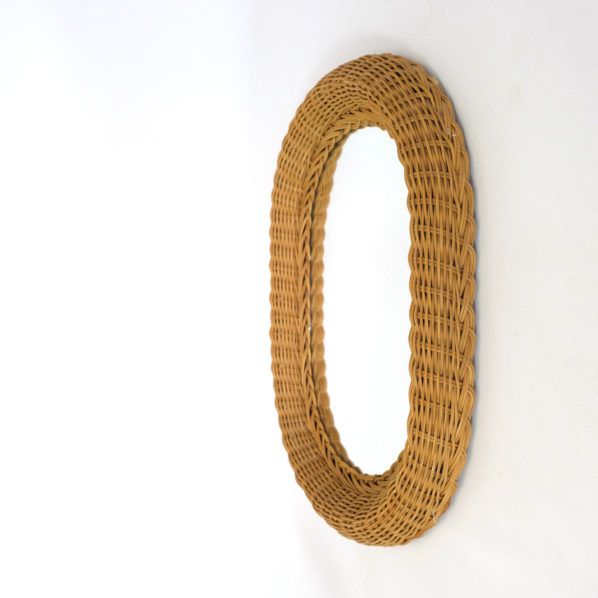 Mirror with thick wicker frame, 54x38 cm.