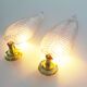 Pair of brass and muranoglass shell sconces