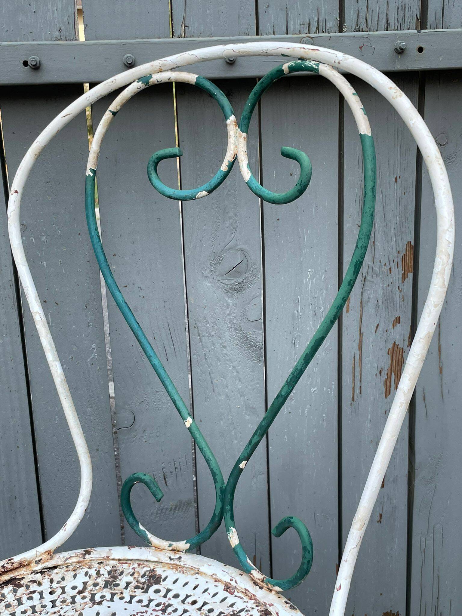 pair of antique wrought iron garden chairs