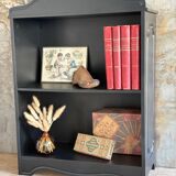 Blackened bookcase to place or hang