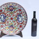 Imari porcelain charger with chrysanthemum flowers, peaches and ho-o birds, Japan, Showa era.