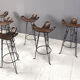 Ensemble de 6 tabourets de bar brutalistes, en fer forgé, années 1960.