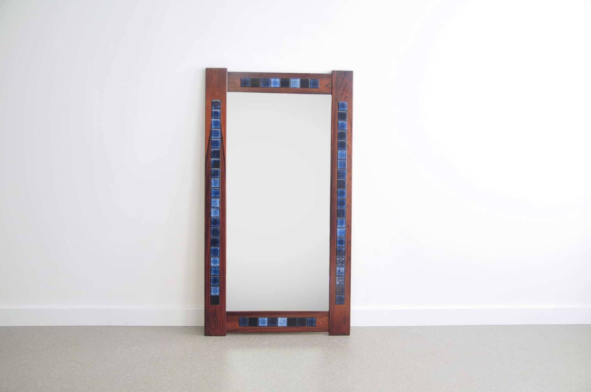 Rosewood mirror with blue ceramic tiles