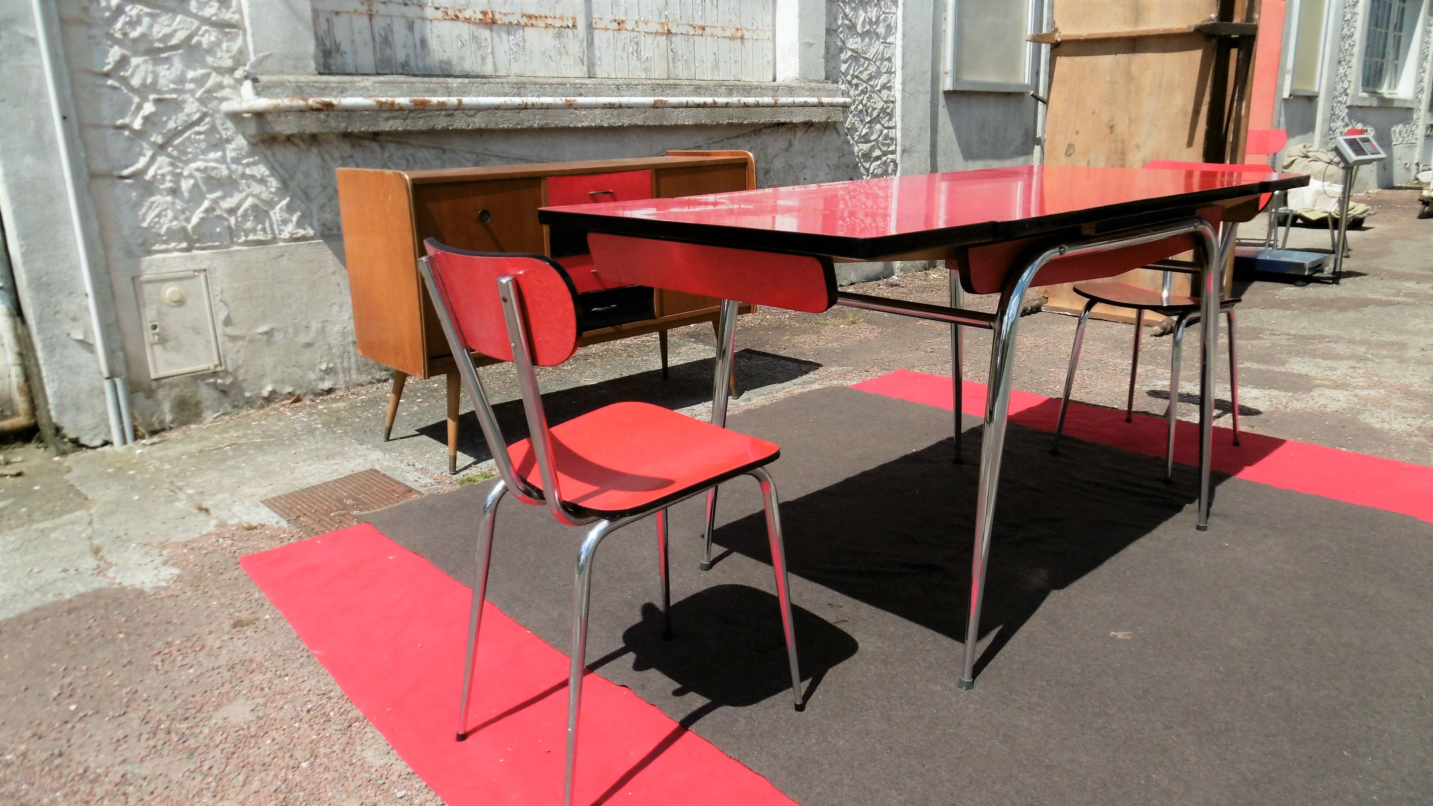 Red formica table and two chairs