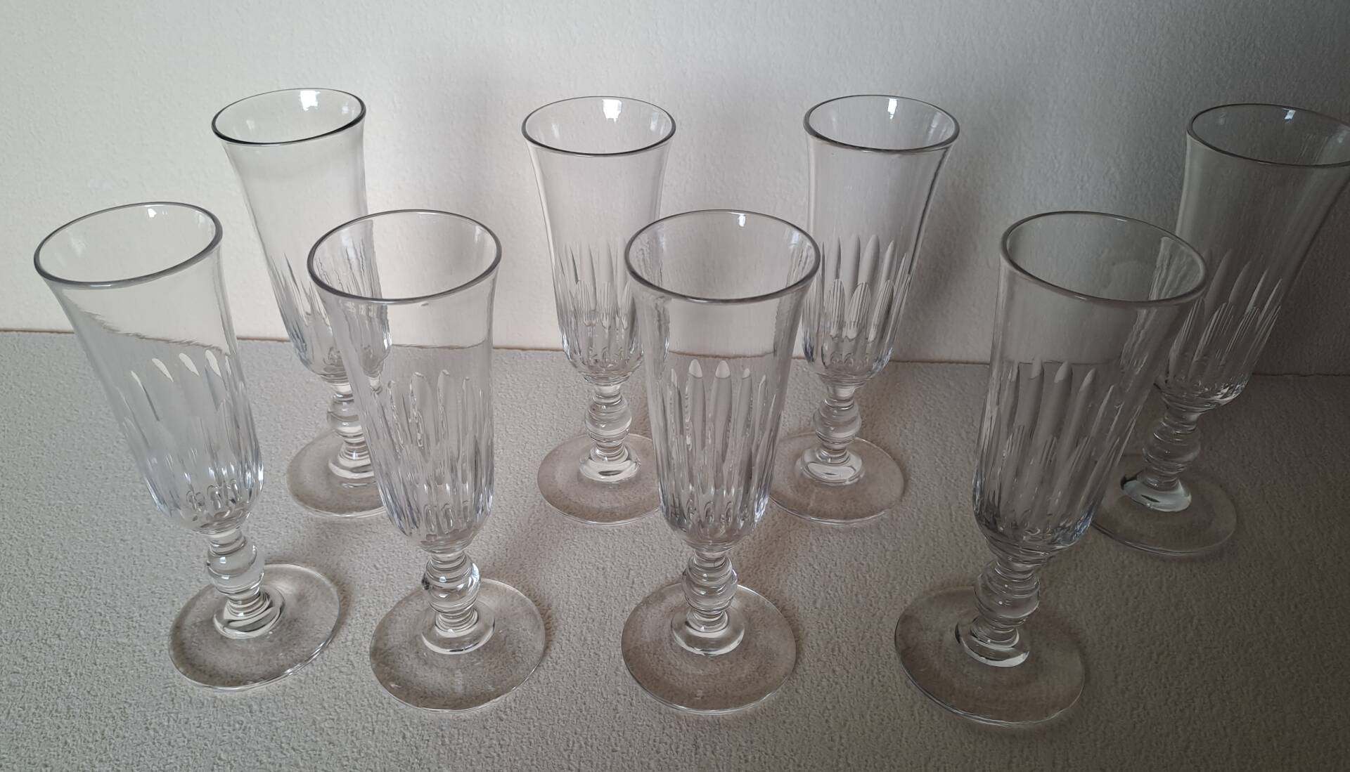 8 crystal Champagne flutes from Baccarat Saint Louis, 19th century.