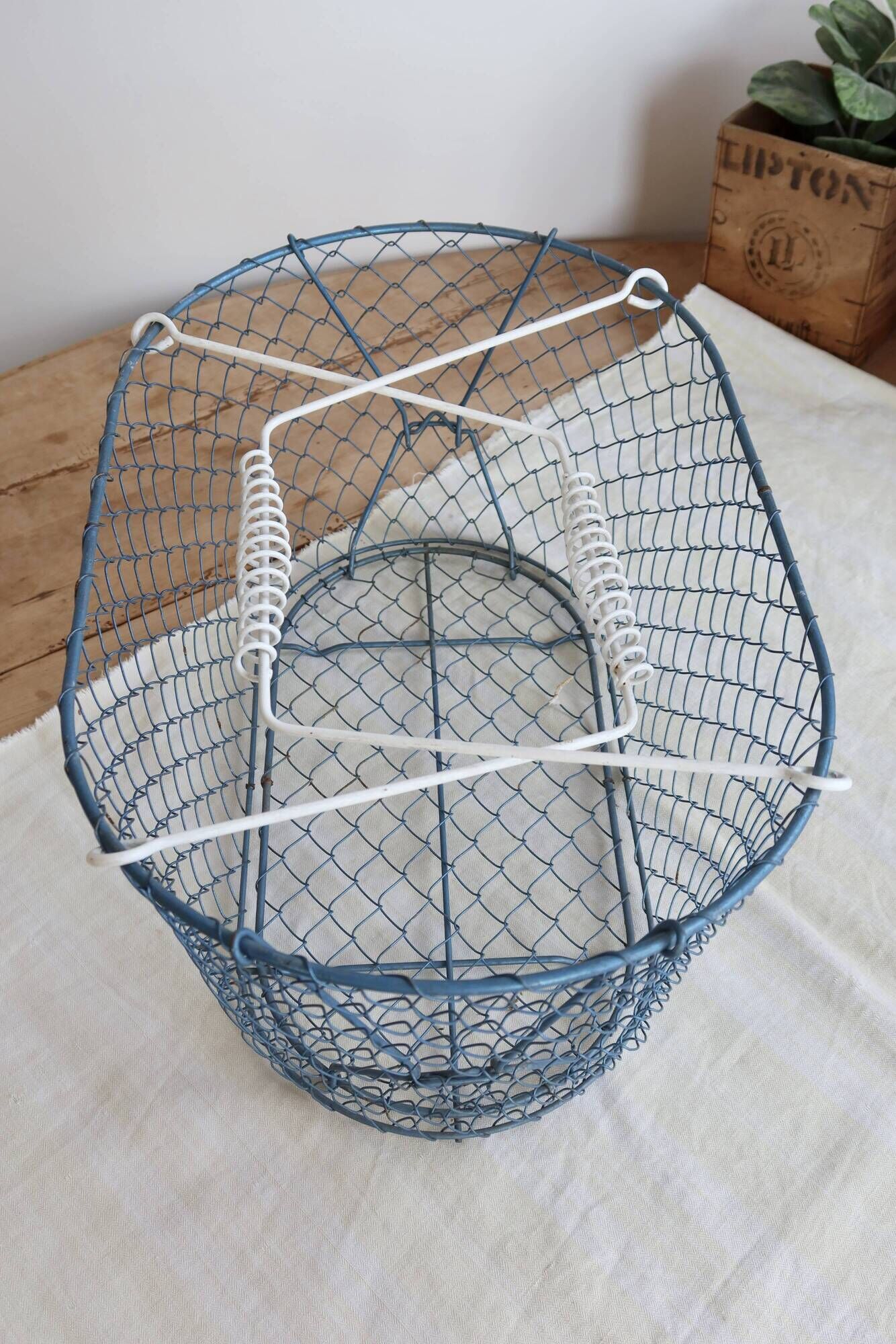Large vintage blue wire basket