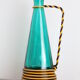 Vase in green glass and lanyards 70s doilies