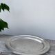 Oval stainless steel dish, signed Rémi Letang