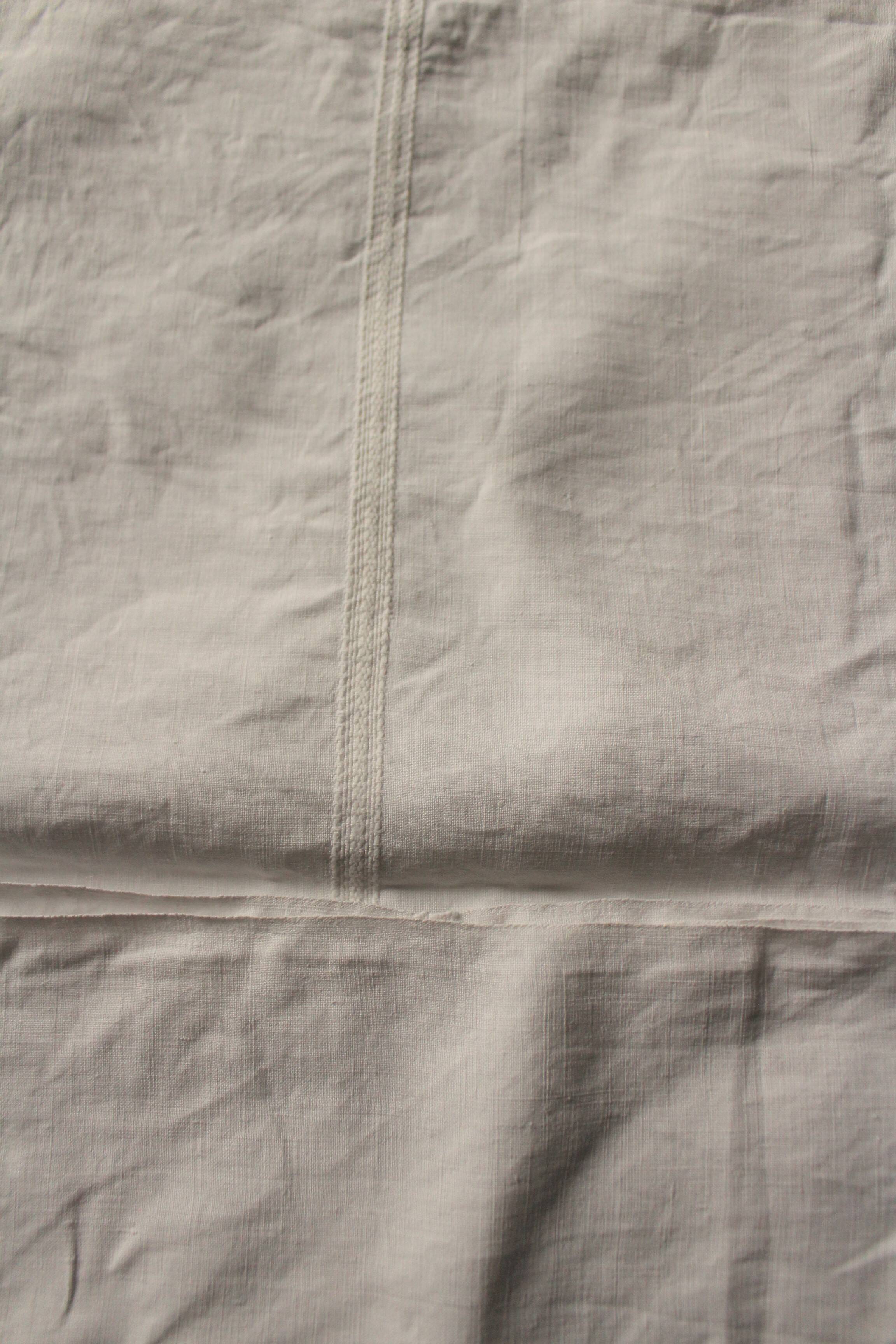 Un Lot de 2 serviettes de table lin blanc monogrammes G D