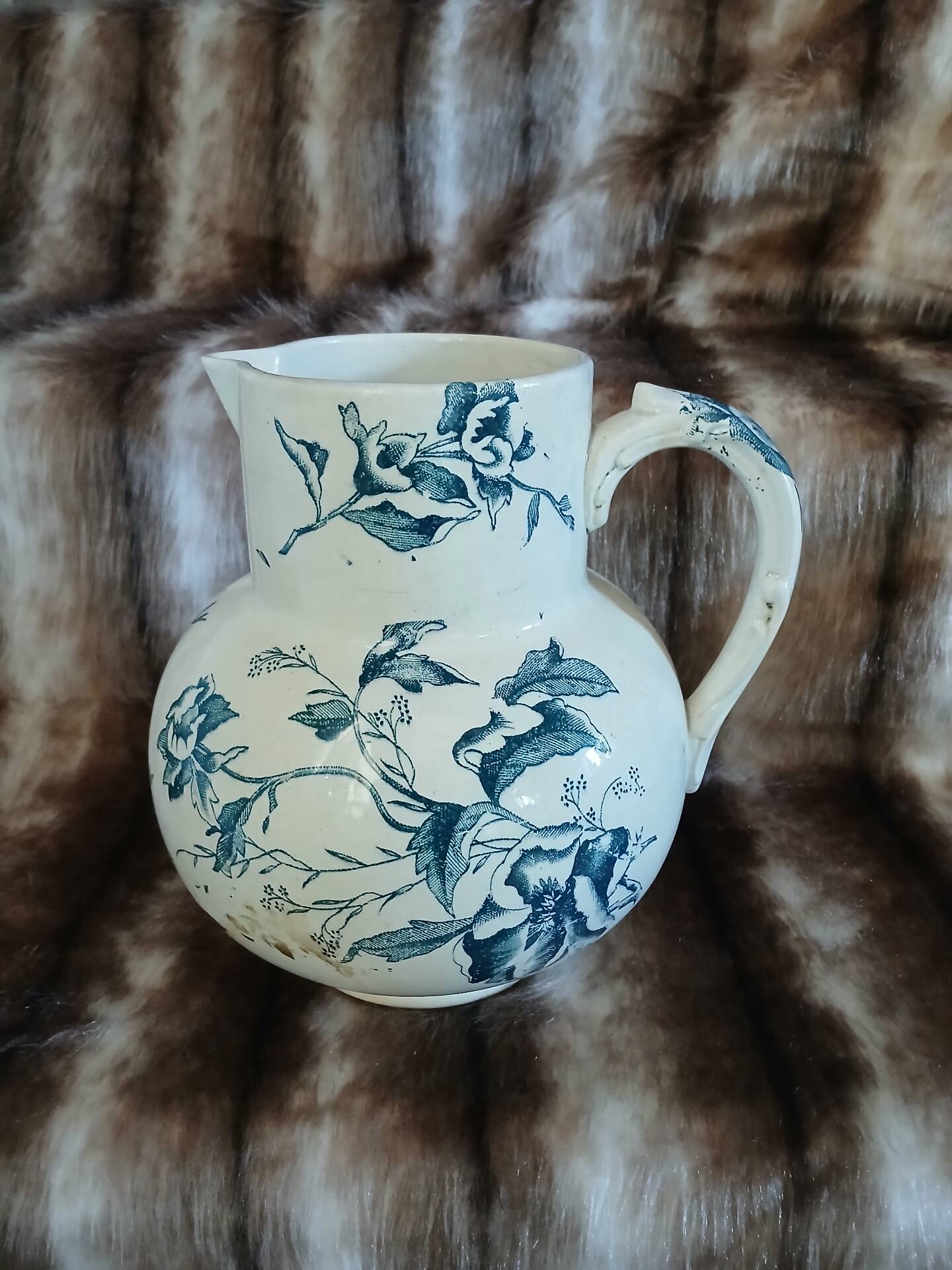 Antique pitcher in ironstone