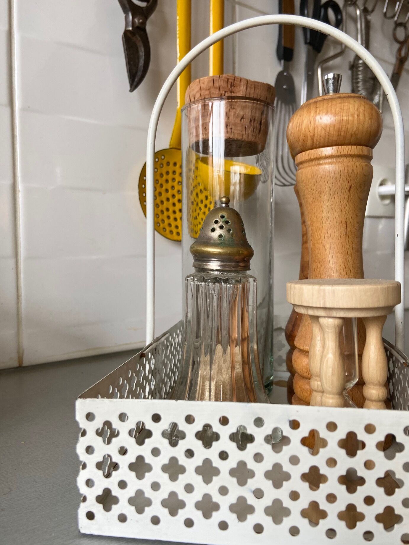 White perforated metal table basket