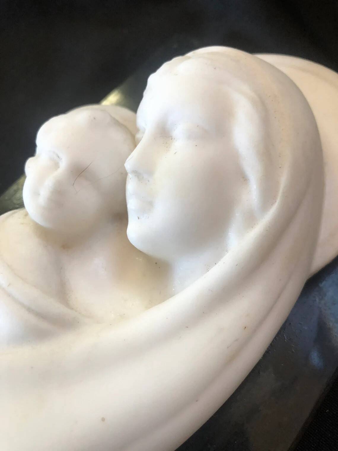 Virgin and Child bas relief in alabaster on black marble Inactive Photos