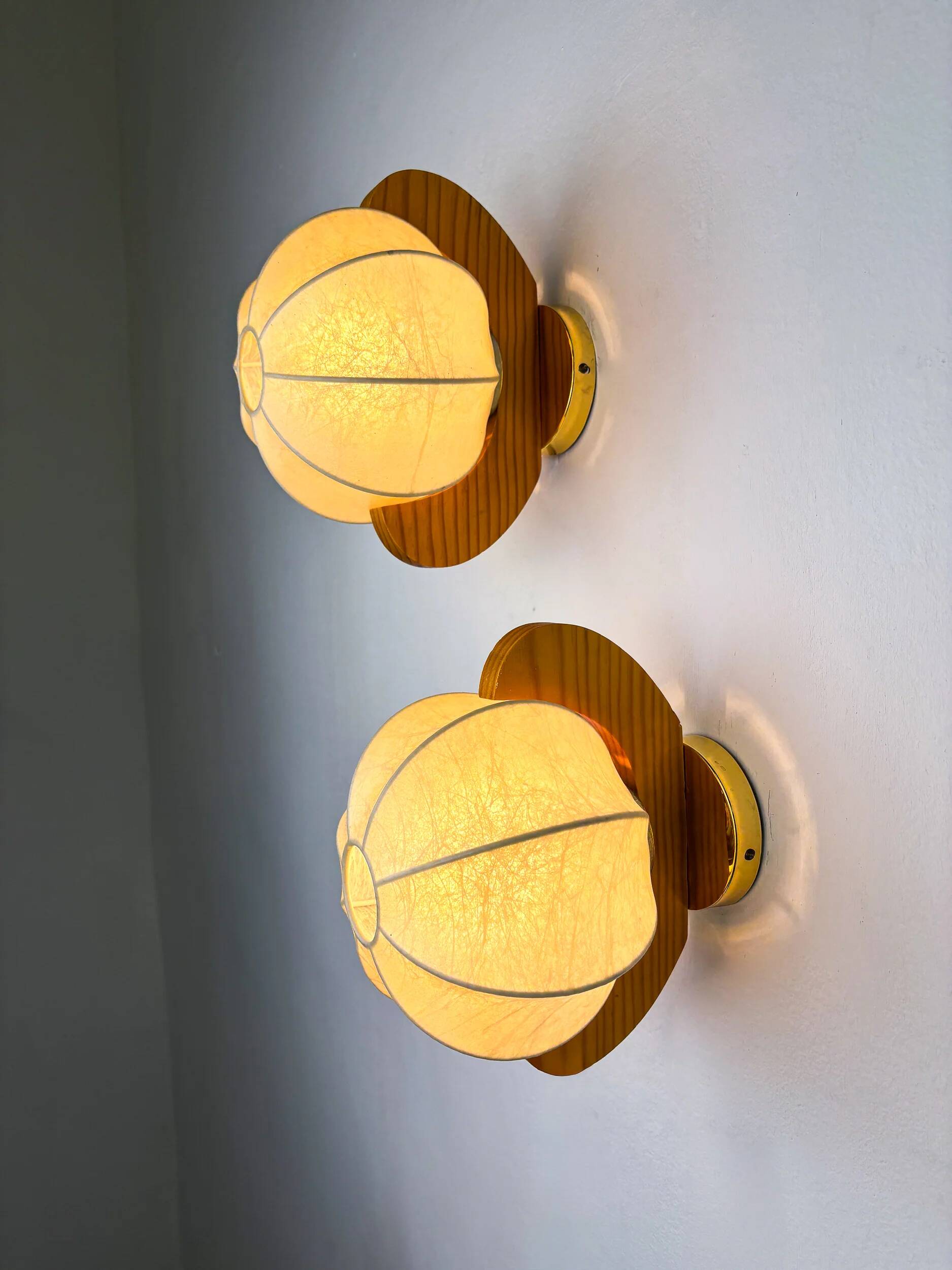 Pair of cocoon sconces with pine, Italy, 1970