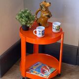 Vintage / designer / orange plastic rolling trolley,