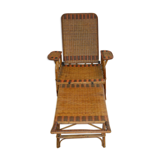 Vintage rattan lounge chair / garden chair