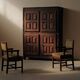 Pair of modernist armchairs in solid oak, France, circa 1940.